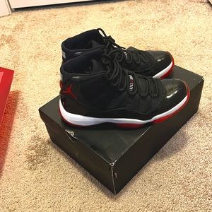 Preowned Authentic Mens size 11 Air Jordan Retro 11 Breds “2012”